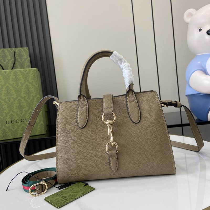 G*u*i top handle bags